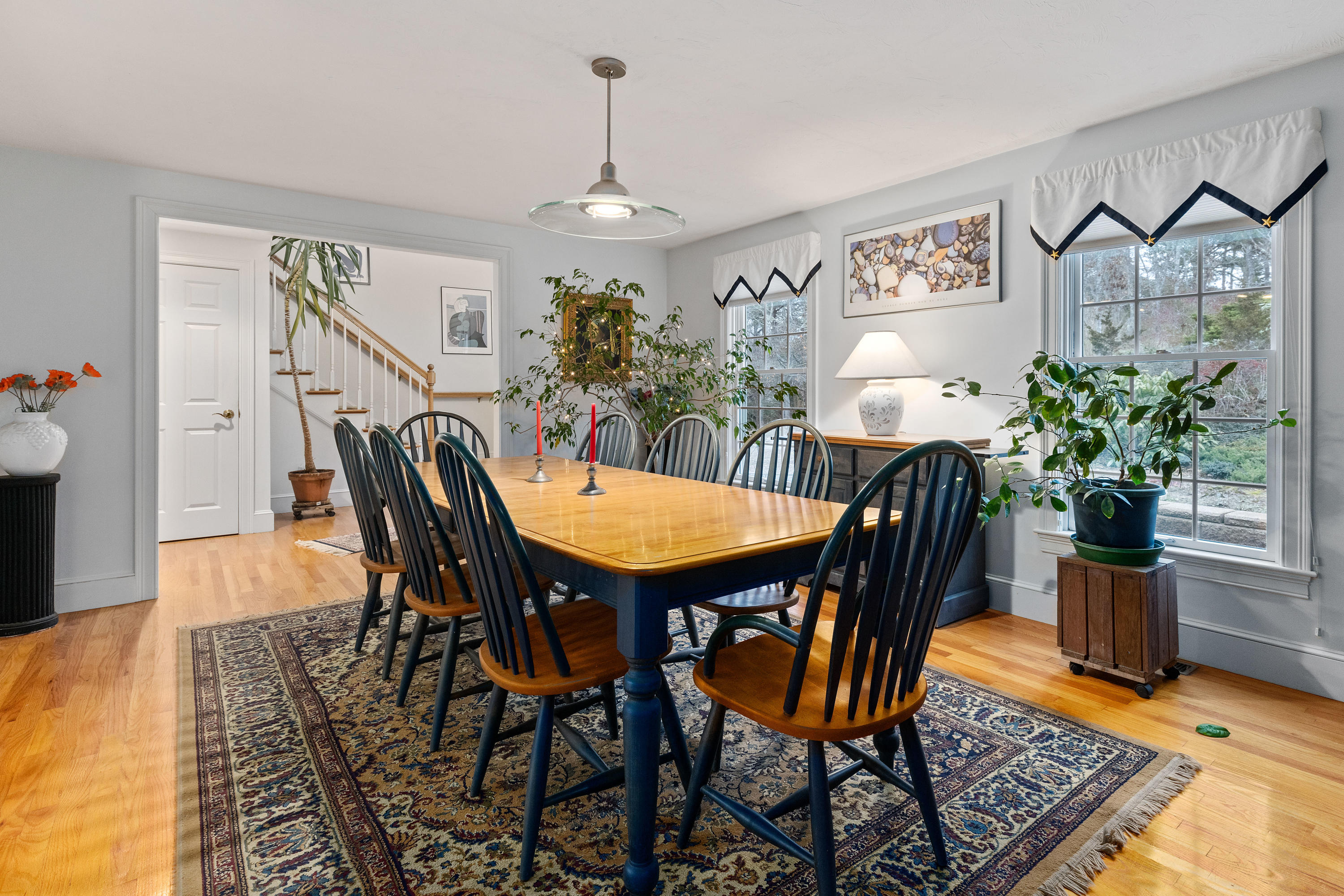 3 Parsons Path Harwich, MA 02645 - Photo 7 of 62 a view of a dining room with furniture and wooden floor
