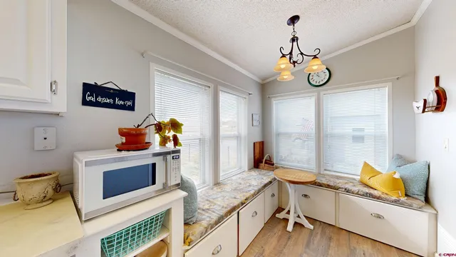 a kitchen with stainless steel appliances granite countertop a stove and a sink