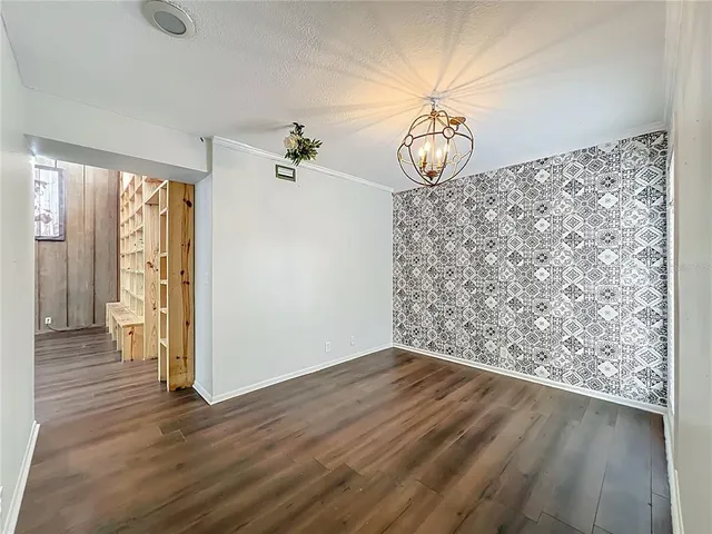 a kitchen with a sink appliances and a counter top space