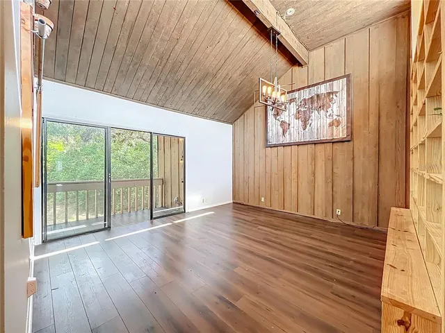 a view of a livingroom with wooden floor