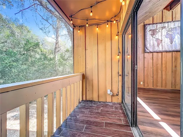 a view of a livingroom with wooden floor