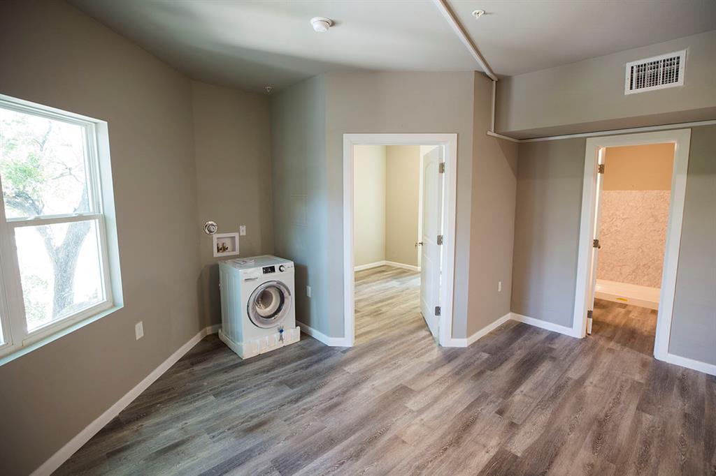 911 West 22nd Street, Unit 303 Austin, TX 78705 - Photo 20 of 23 a view of a storage & utility room with closet area