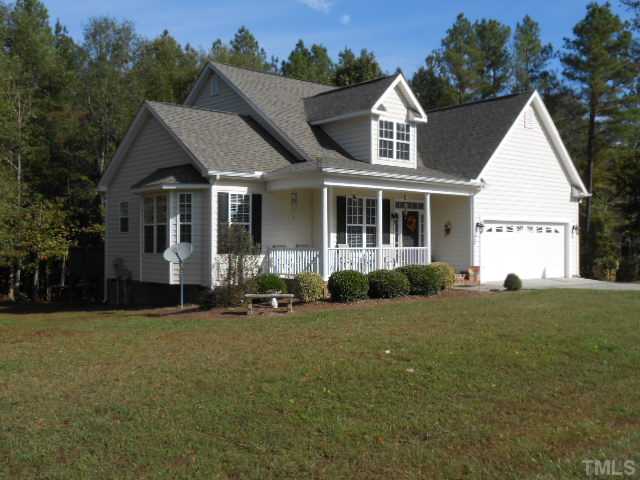 228 Sandstone Road Henderson, NC 27537 - Photo 1 of 25 Front view of home on corner lot in Huntstone subdivision.