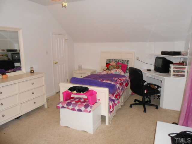 228 Sandstone Road Henderson, NC 27537 - Photo 15 of 25 Bedroom 4 with built-in corner desk and window seat.