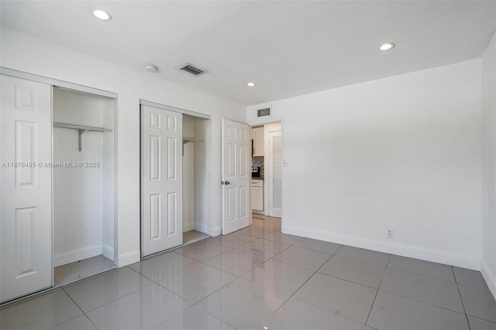 2201 Northeast 14th Avenue, Unit 9 Wilton Manors, FL 33305 - Photo 29 of 30 a view of an empty room