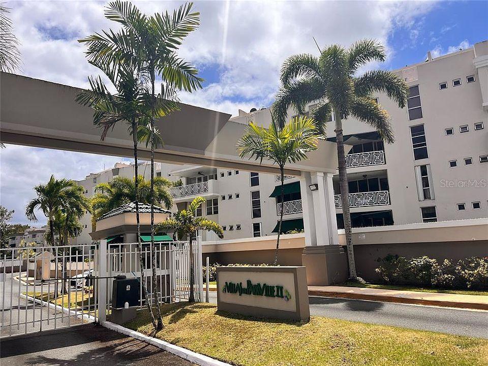 a view of a building with a swimming pool