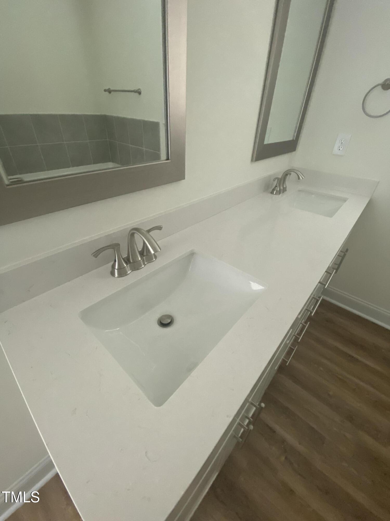 3862 Blackhills Road Fayetteville, NC 28311 - Photo 11 of 15 a bathroom with a sink and a mirror