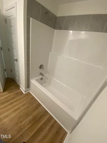 a bathroom with a bathtub
