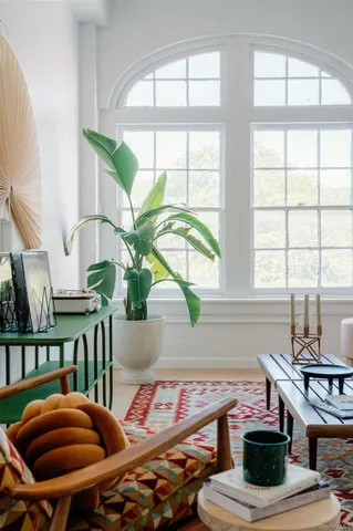 a room with furniture and a window