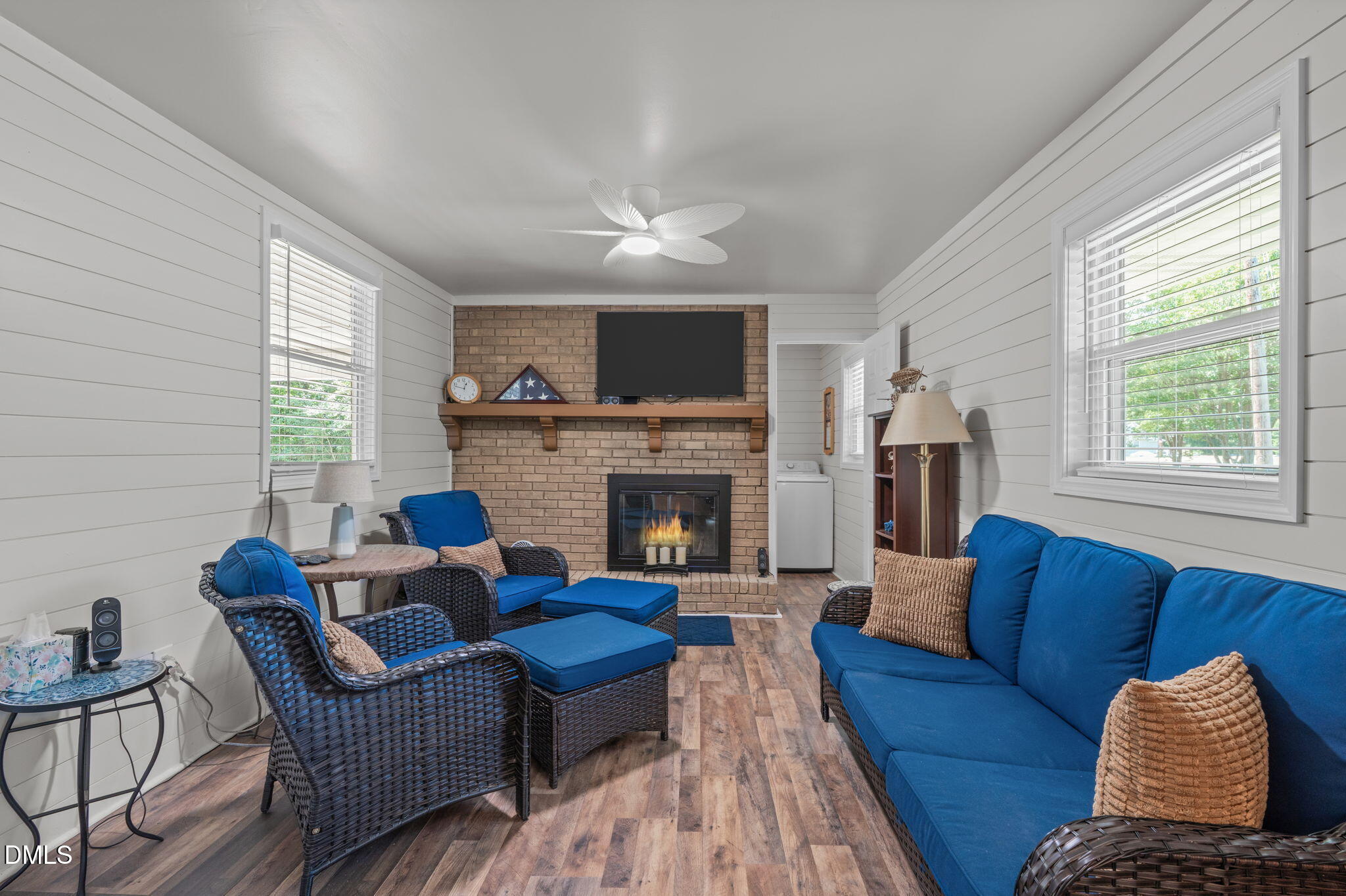 995 Shawtown Road Lillington, NC 27546 - Photo 4 of 27 Brick surround, wood mantle, new windows and shiplap. Ideal as a den, home office, dining room, or whatever suits your family's needs.