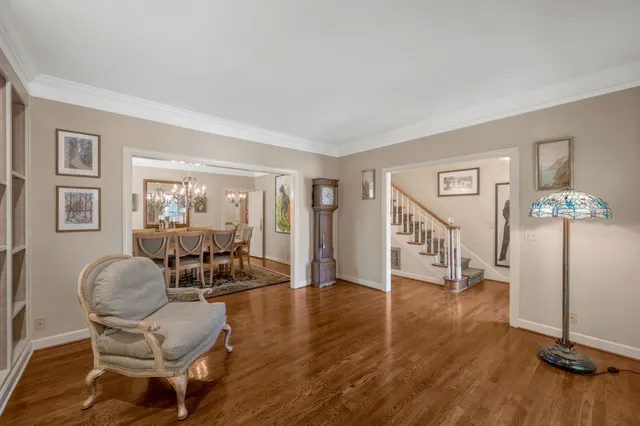a view of a livingroom with furniture and a flat screen tv