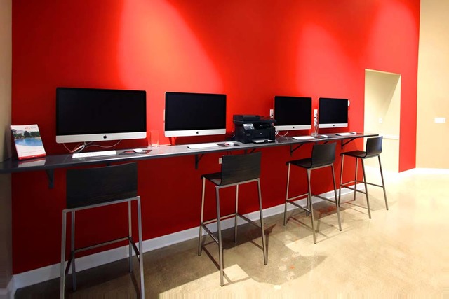 1650 Buttonwood Circle, Unit 3114 Schaumburg, IL 60173 - Photo 20 of 30 a view of a workspace with a flat screen tv