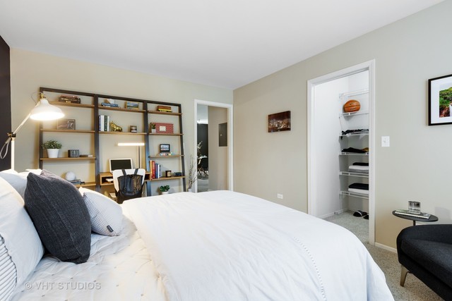 1650 Buttonwood Circle, Unit 3114 Schaumburg, IL 60173 - Photo 10 of 30 a bed room with a bed and a television