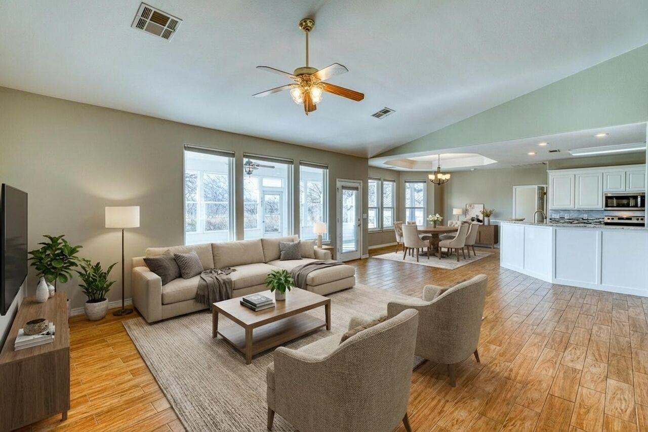 2804 Oak Ridge Drive Horseshoe Bay, TX 78657 - Photo 7 of 30 a living room with furniture and a large window