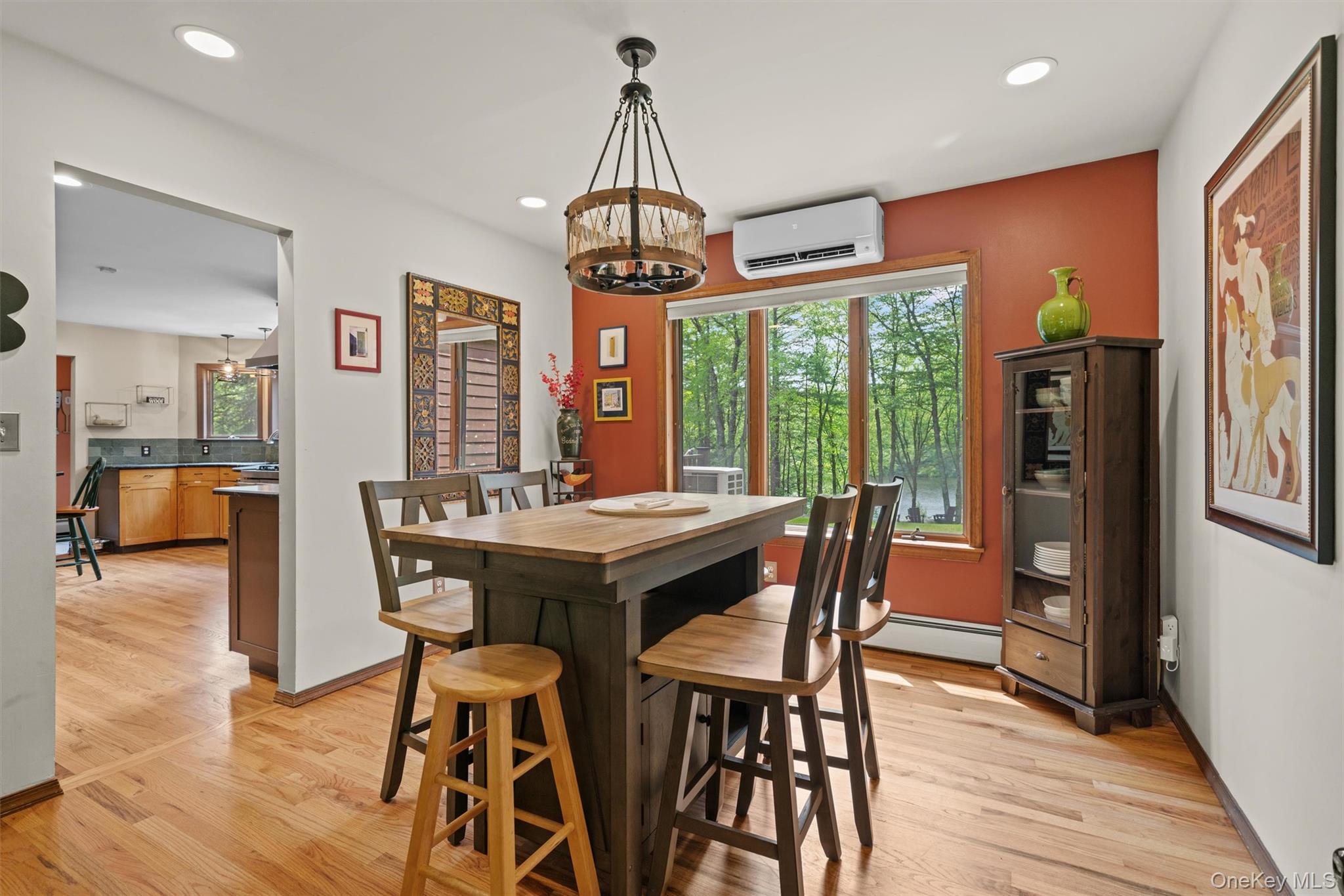 1775 Plank Rd Section A Forestburgh, NY 12777 - Photo 12 of 50 Dining space with a wall mounted AC, a chandelier, light wood-style flooring, a baseboard radiator, and recessed lighting