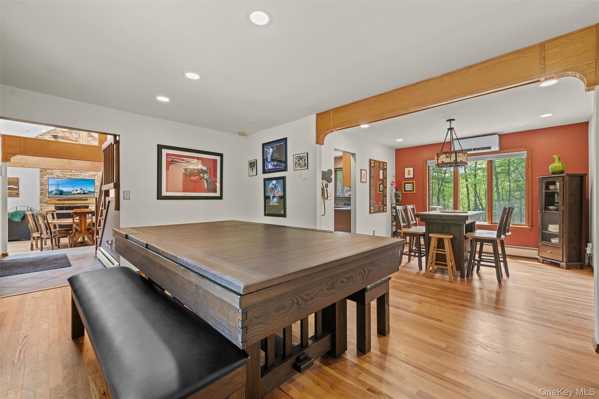 1775 Plank Rd Section A Forestburgh, NY 12777 - Photo 14 of 50 Recreation room with a wall mounted air conditioner, light wood finished floors, and recessed lighting