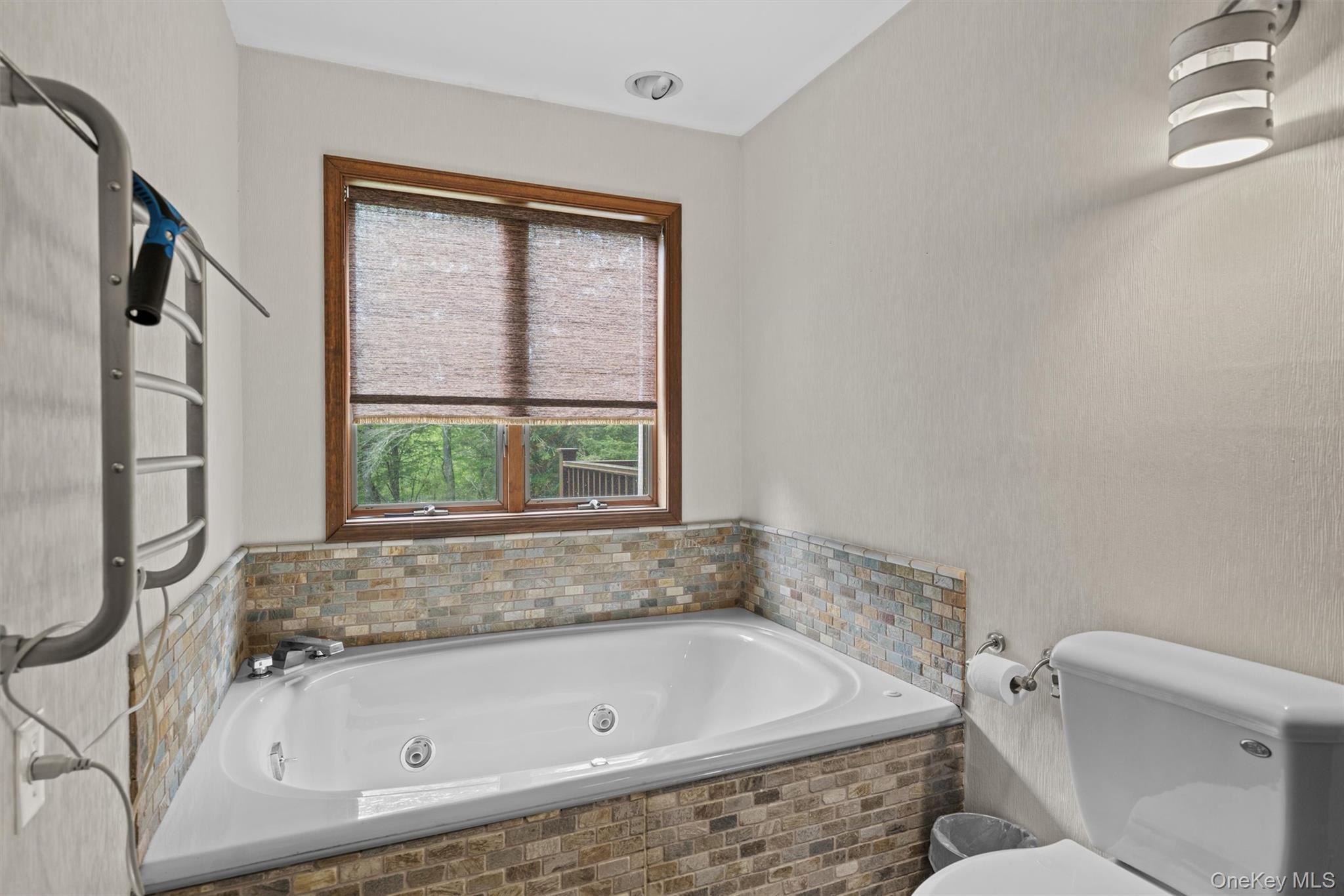 1775 Plank Rd Section A Forestburgh, NY 12777 - Photo 23 of 50 Bathroom with a tub with jets and toilet