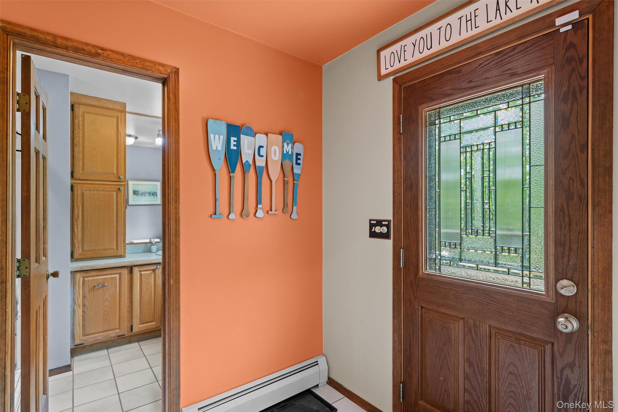 1775 Plank Rd Section A Forestburgh, NY 12777 - Photo 28 of 50 Entrance foyer featuring a baseboard heating unit, light tile patterned flooring, and baseboards