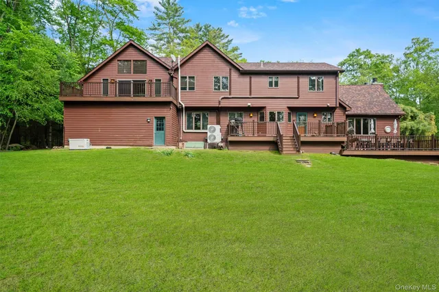 a view of balcony with wooden floor and fence