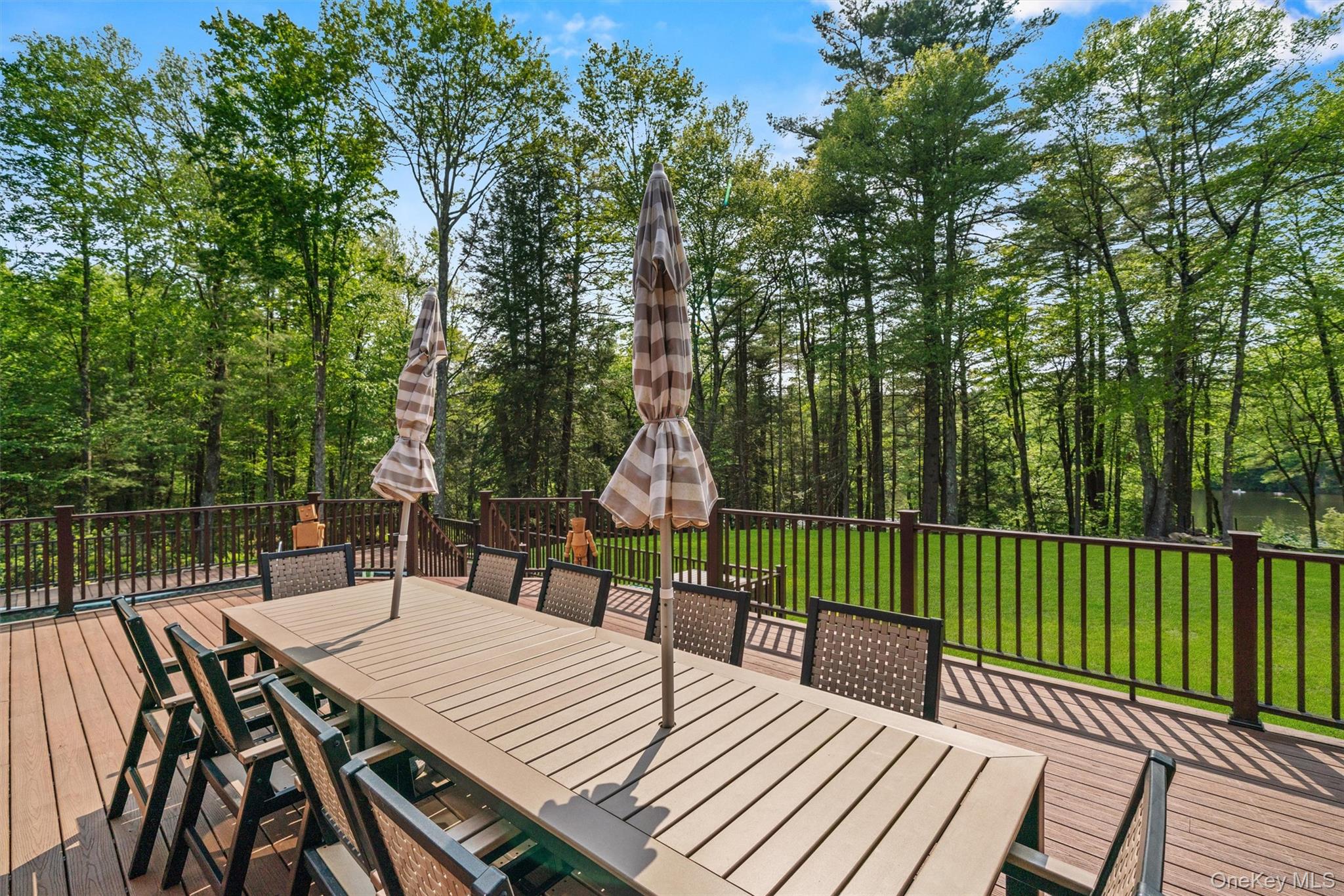 1775 Plank Rd Section A Forestburgh, NY 12777 - Photo 32 of 50 Deck featuring outdoor dining area and a lawn