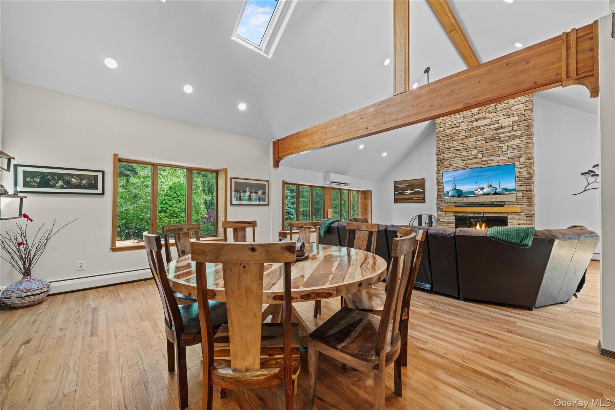 1775 Plank Rd Section A Forestburgh, NY 12777 - Photo 5 of 50 Dining room featuring light wood-type flooring, recessed lighting, healthy amount of natural light, a baseboard radiator, and beamed ceiling