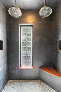 a bathroom with a sink a bathtub and a shower