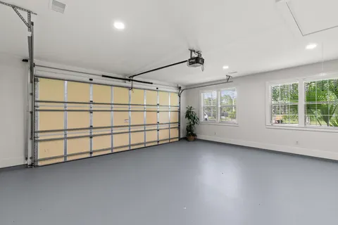 a view of a livingroom with hardwood and furniture