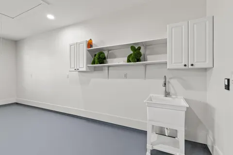 a view of storage and utility room with washer and dryer
