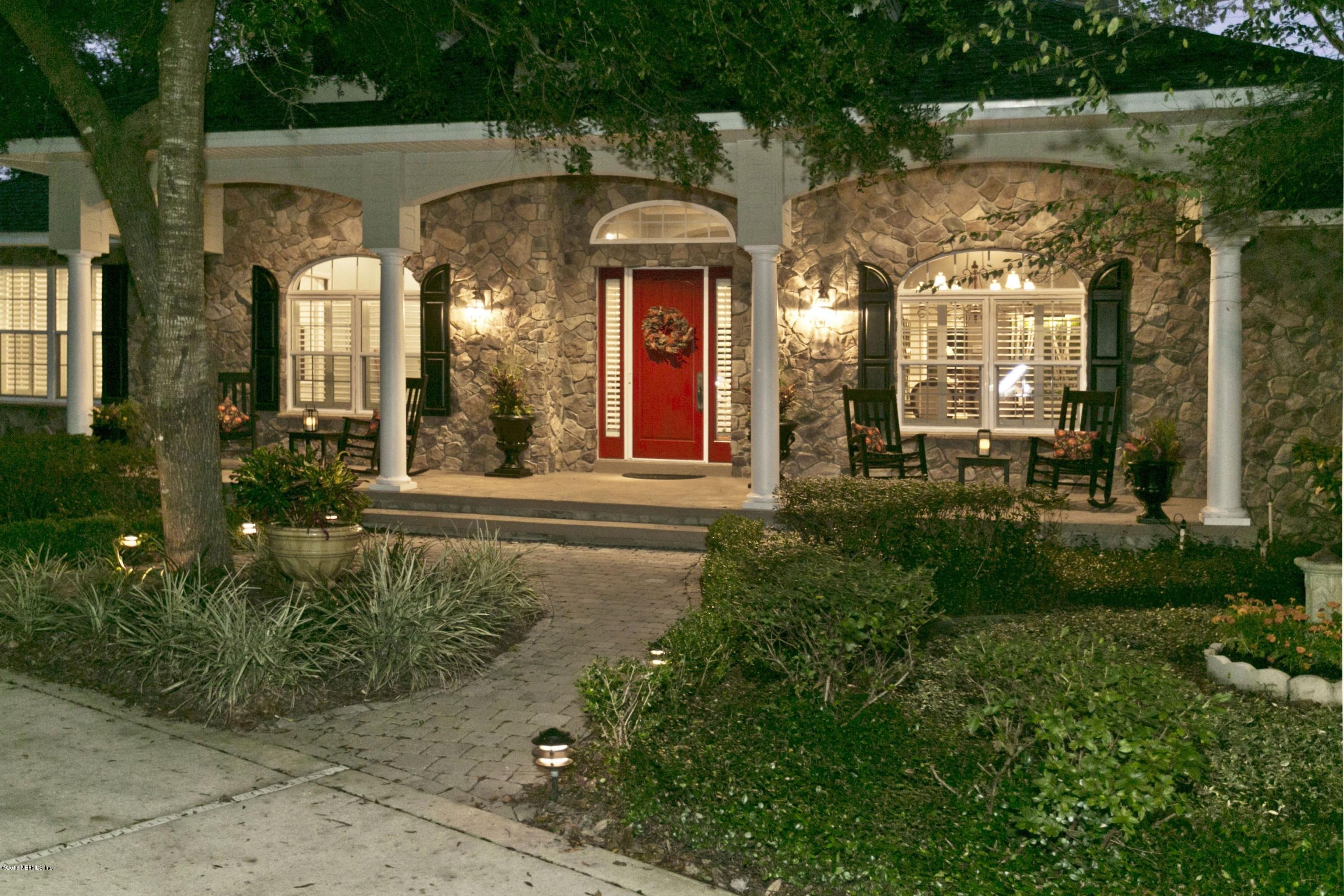 120 Dancing Horse Drive Hastings, FL 32145 - Photo 2 of 65 a front view of a house with a yard