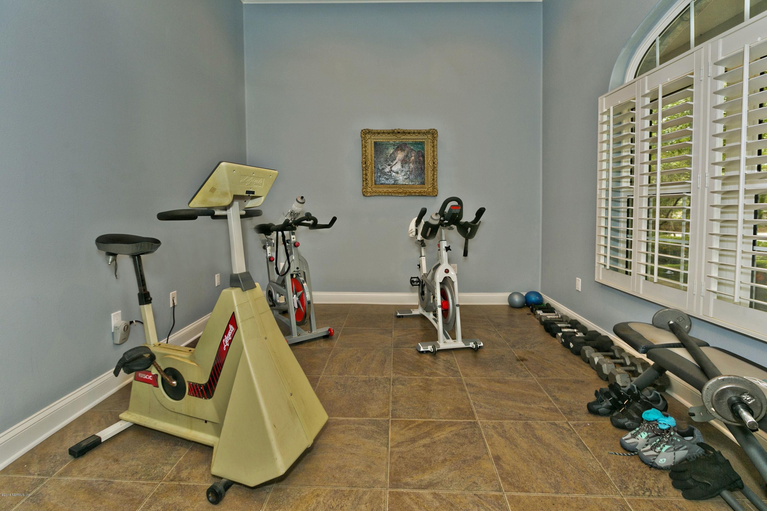 120 Dancing Horse Drive Hastings, FL 32145 - Photo 22 of 65 a view of a room with gym equipment