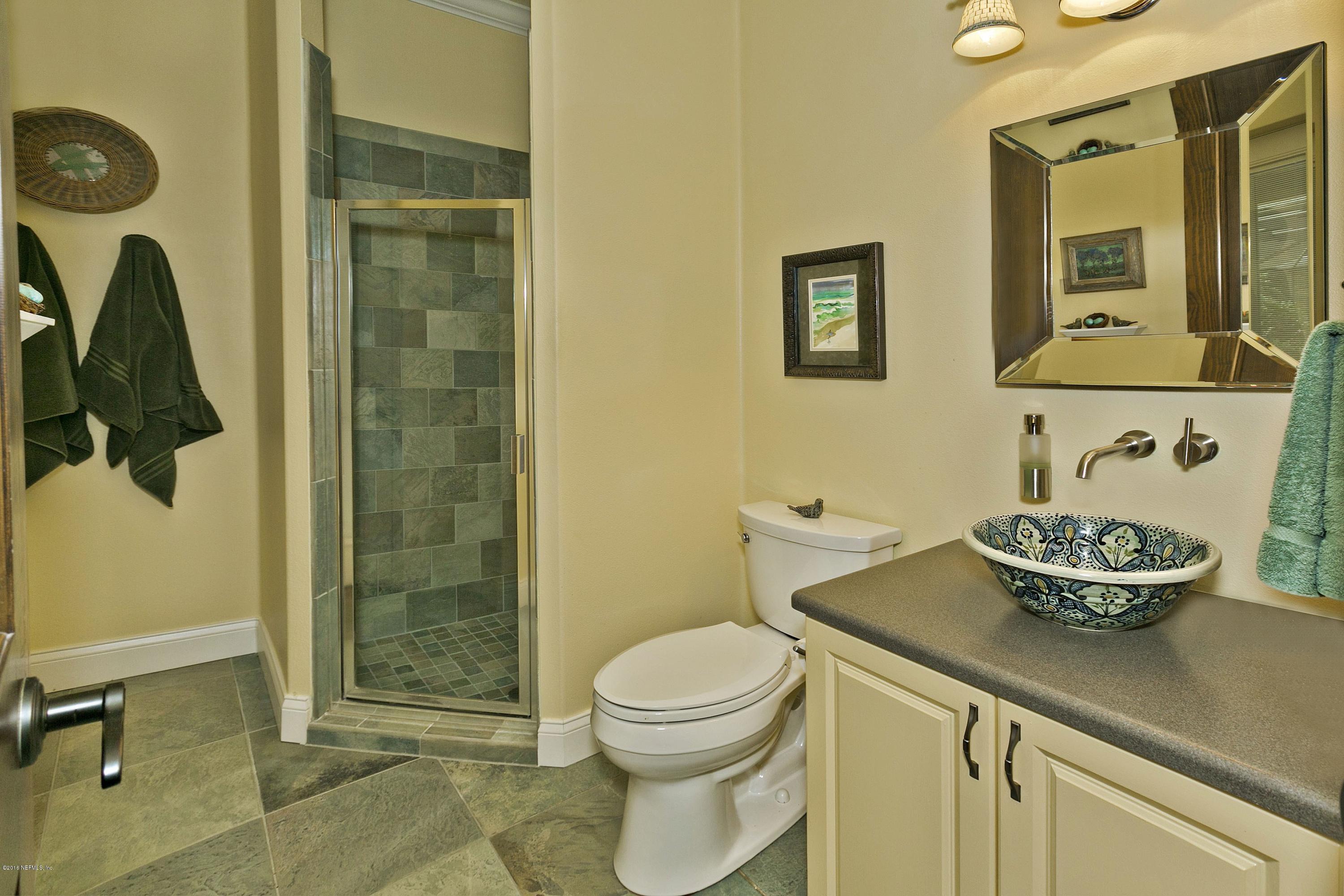 120 Dancing Horse Drive Hastings, FL 32145 - Photo 24 of 65 a bathroom with a toilet and a sink