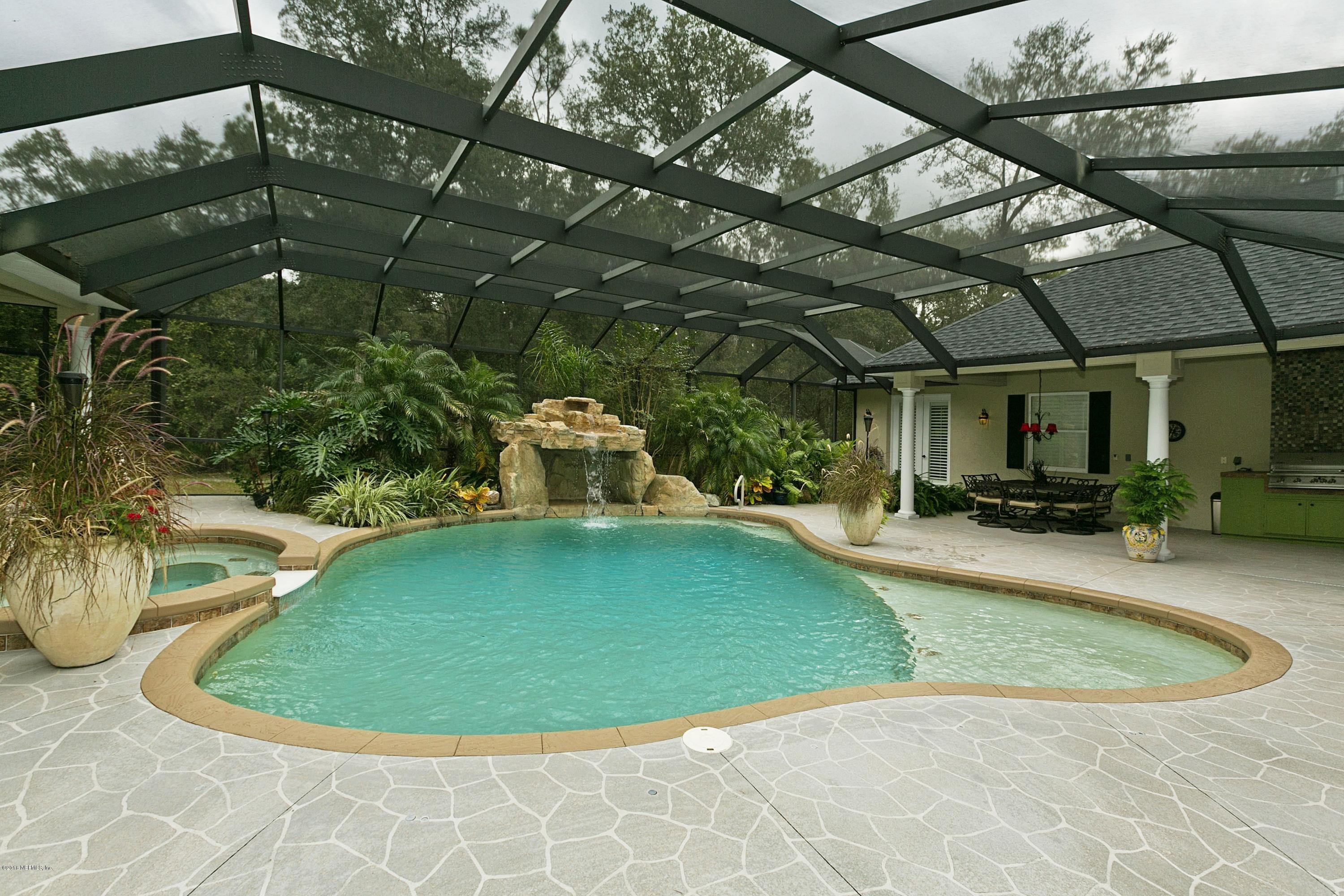 120 Dancing Horse Drive Hastings, FL 32145 - Photo 34 of 65 a view of a swimming pool with a patio
