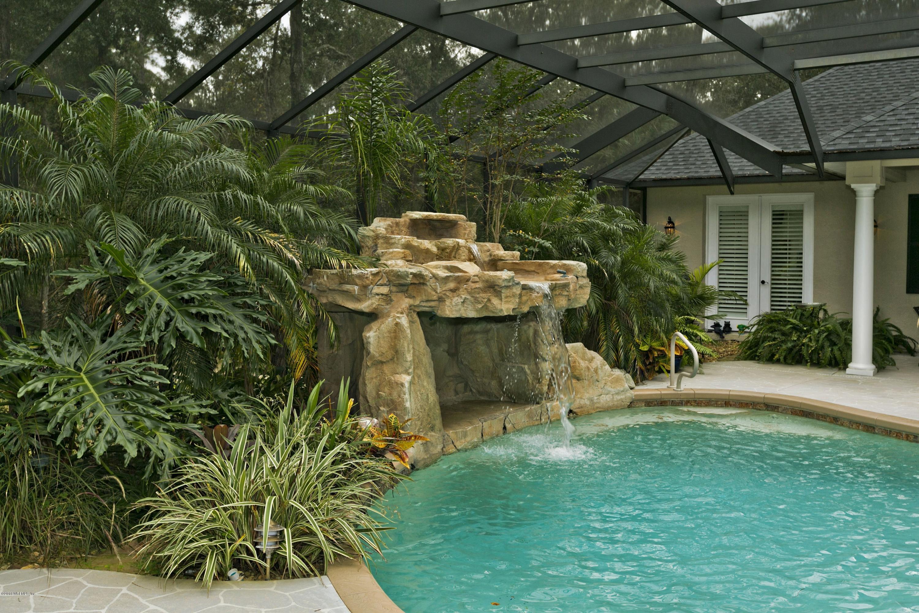 120 Dancing Horse Drive Hastings, FL 32145 - Photo 40 of 65 a view of a house with a yard porch and sitting area