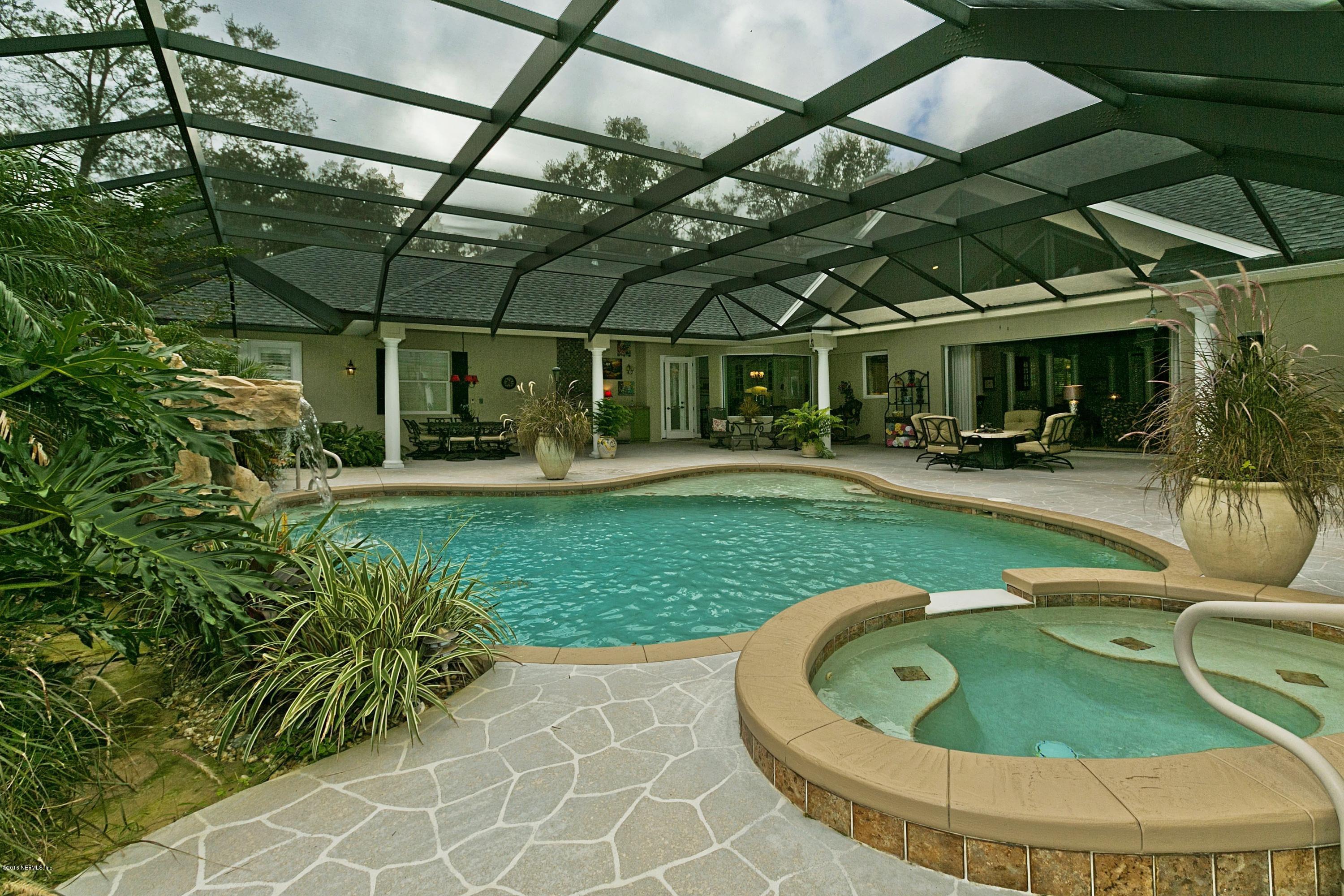 120 Dancing Horse Drive Hastings, FL 32145 - Photo 41 of 65 a view of a swimming pool with a yard
