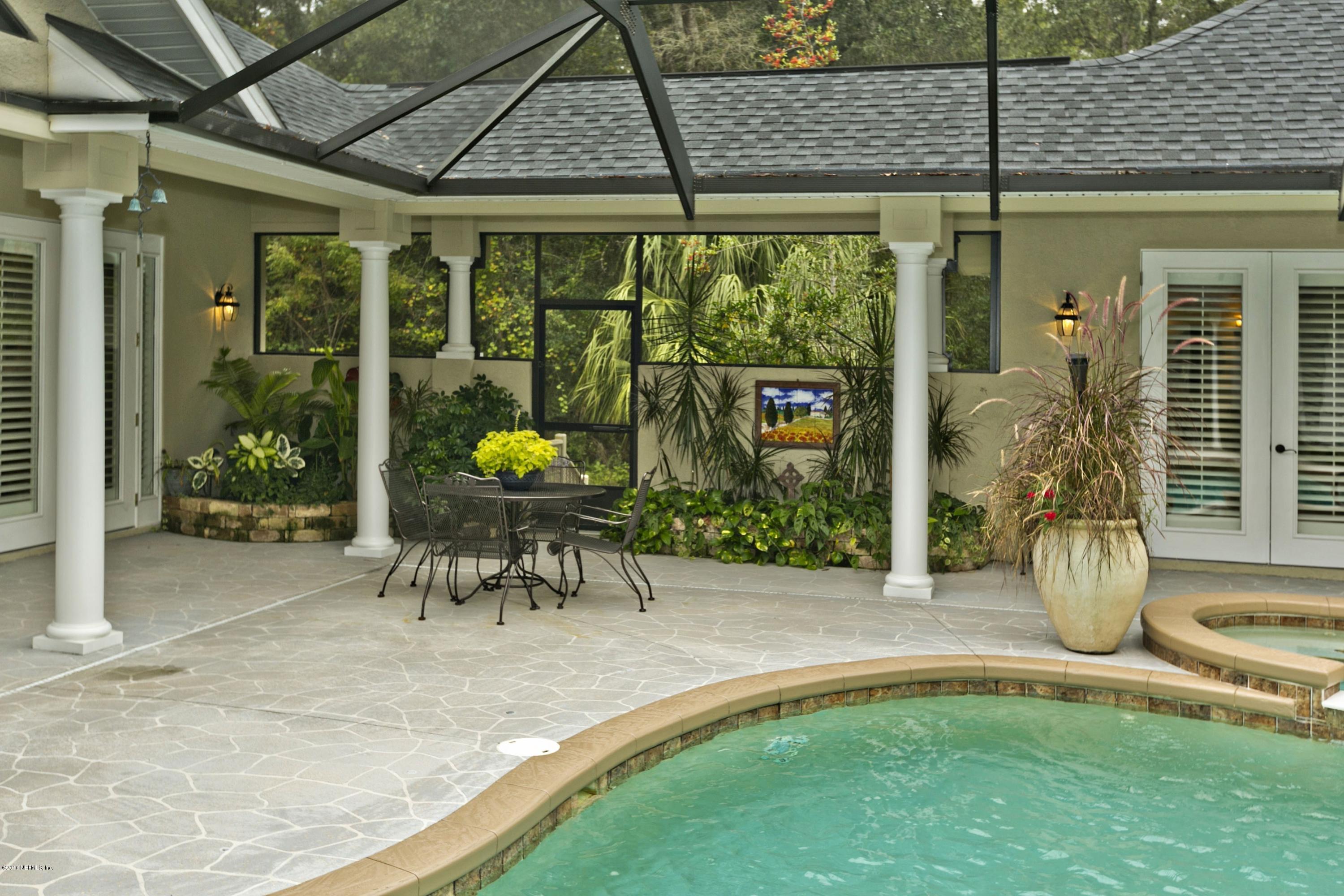 120 Dancing Horse Drive Hastings, FL 32145 - Photo 43 of 65 a view of swimming pool with a table and chairs