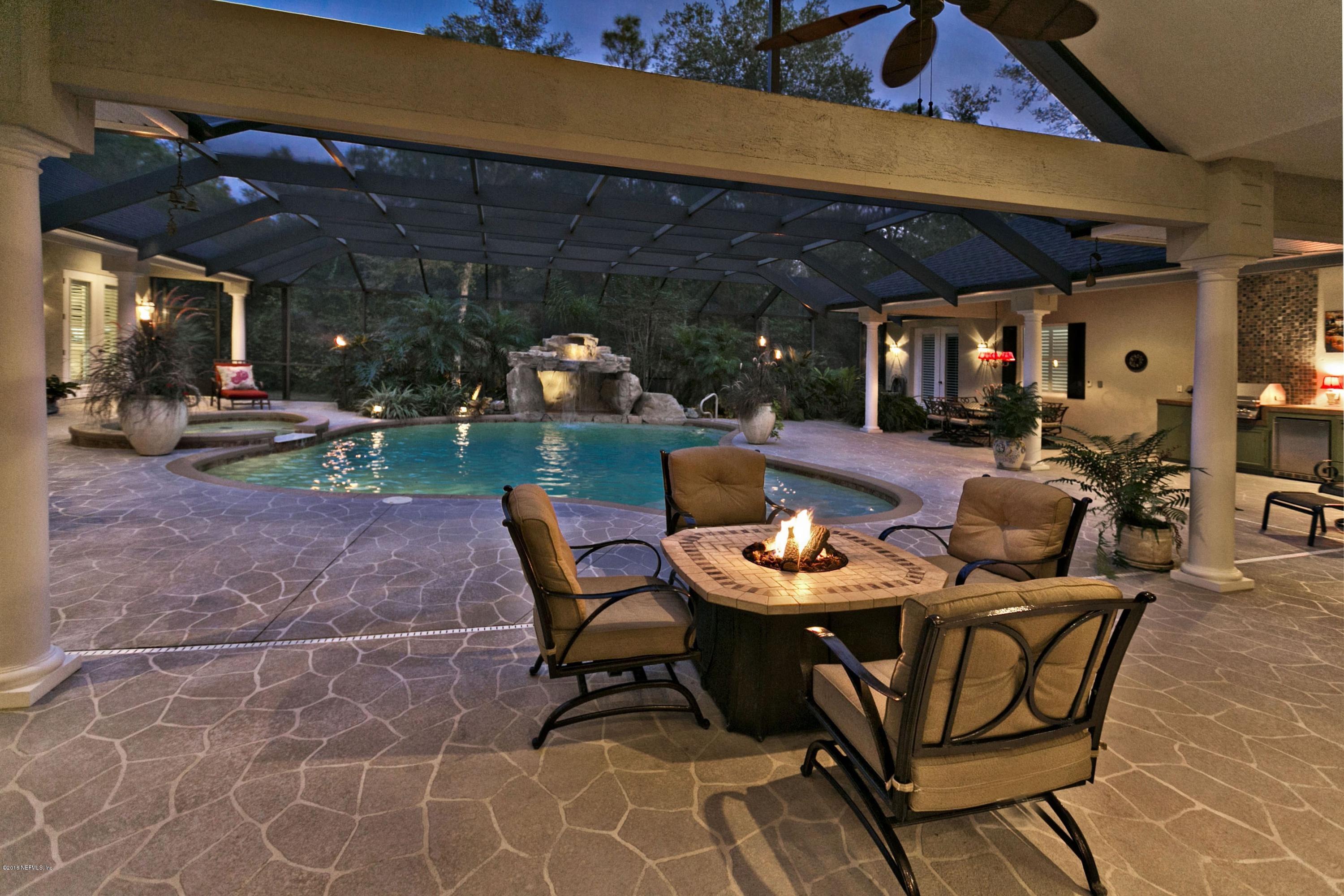 120 Dancing Horse Drive Hastings, FL 32145 - Photo 46 of 65 a patio with table and chairs