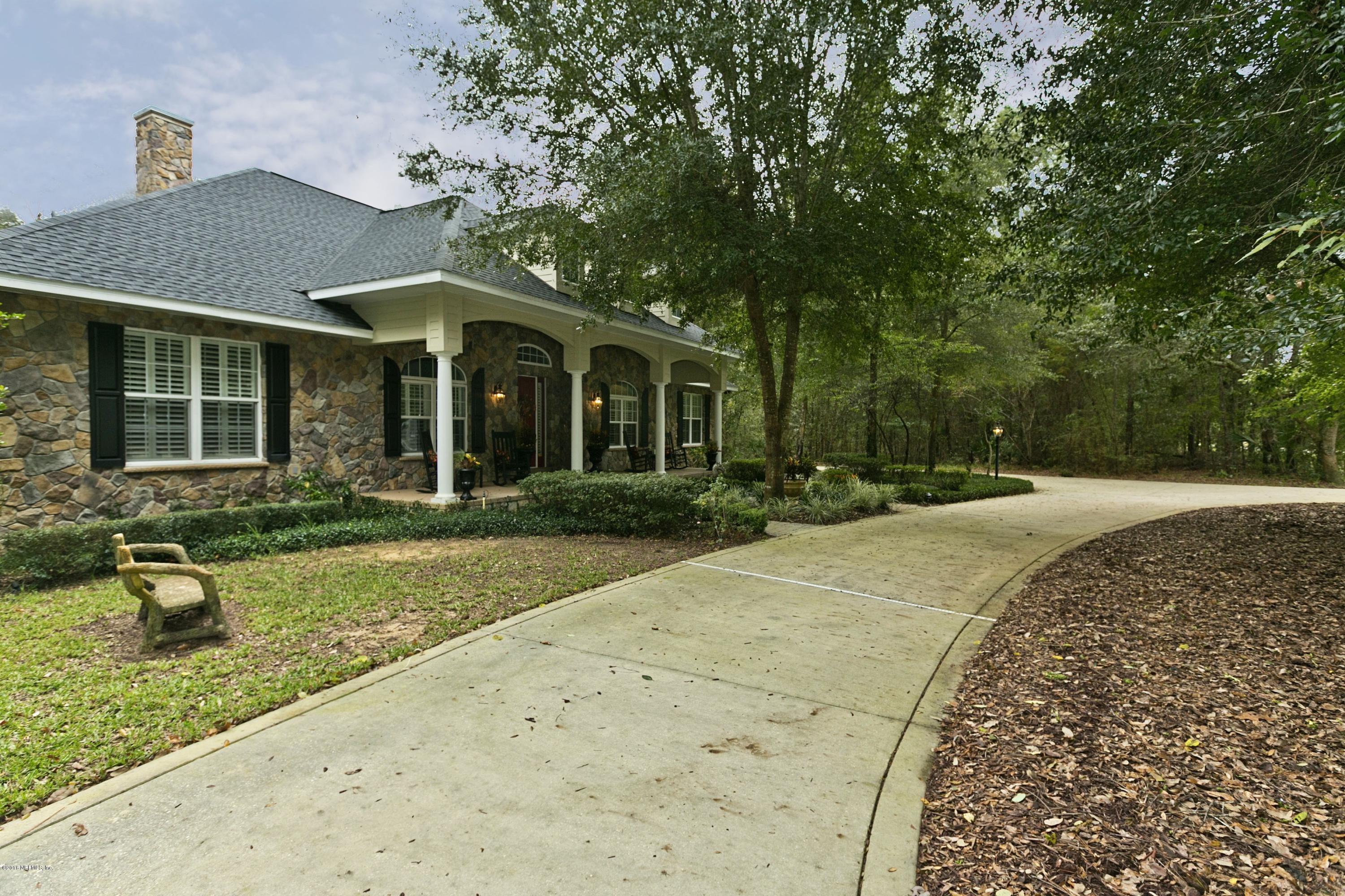 120 Dancing Horse Drive Hastings, FL 32145 - Photo 50 of 65 front view of a house with a yard
