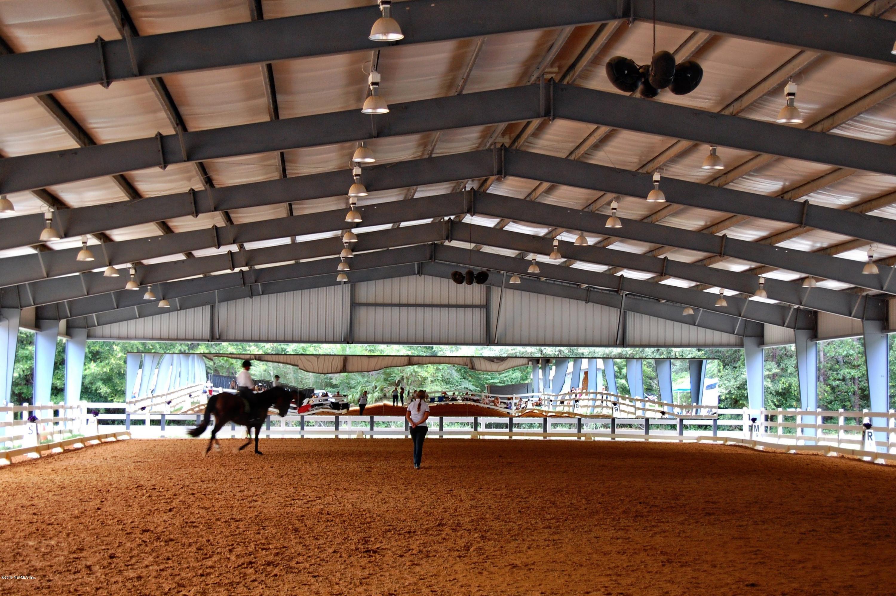 120 Dancing Horse Drive Hastings, FL 32145 - Photo 58 of 65 a view of a water closet with a table and chairs
