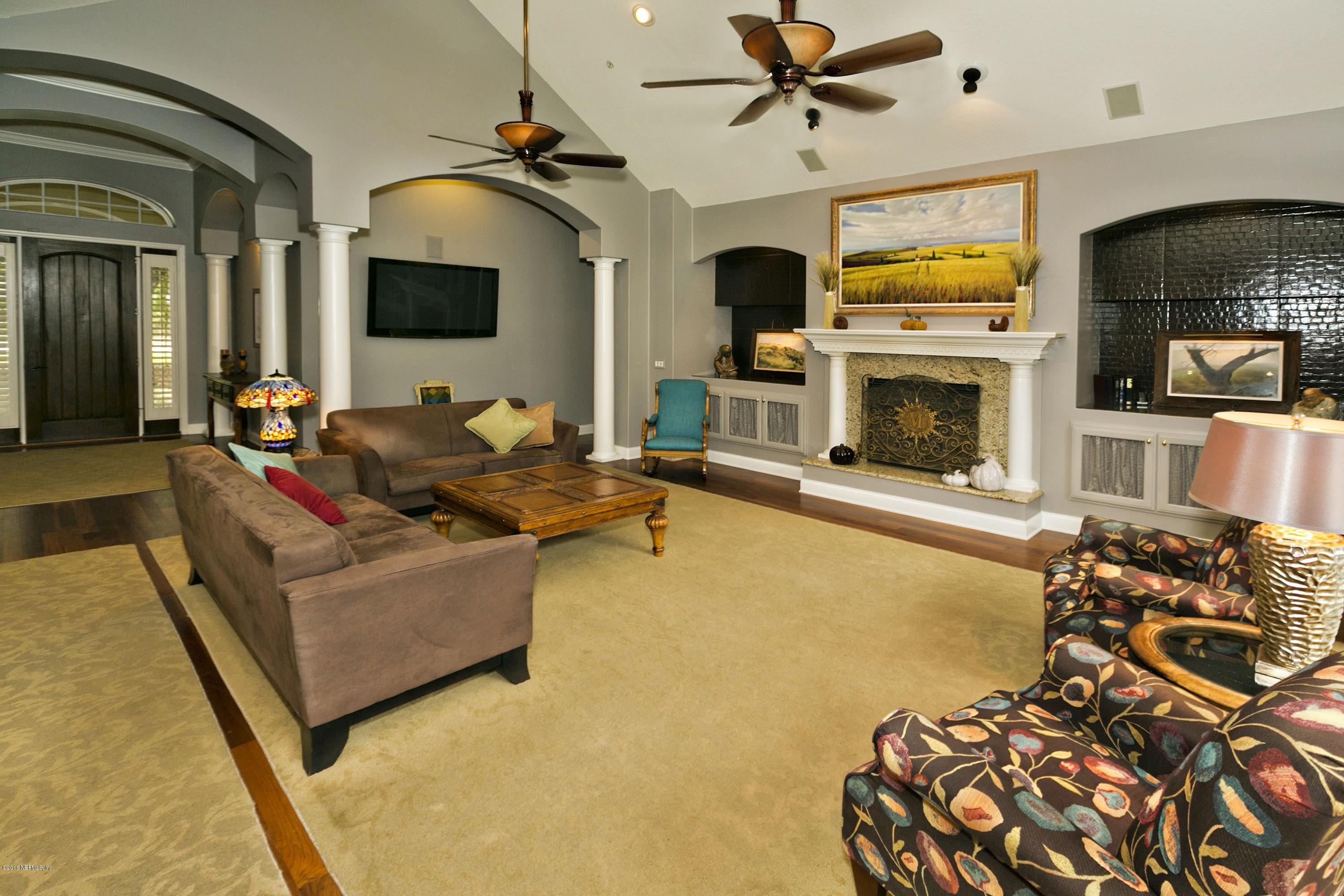 120 Dancing Horse Drive Hastings, FL 32145 - Photo 6 of 65 a living room with furniture and a flat screen tv