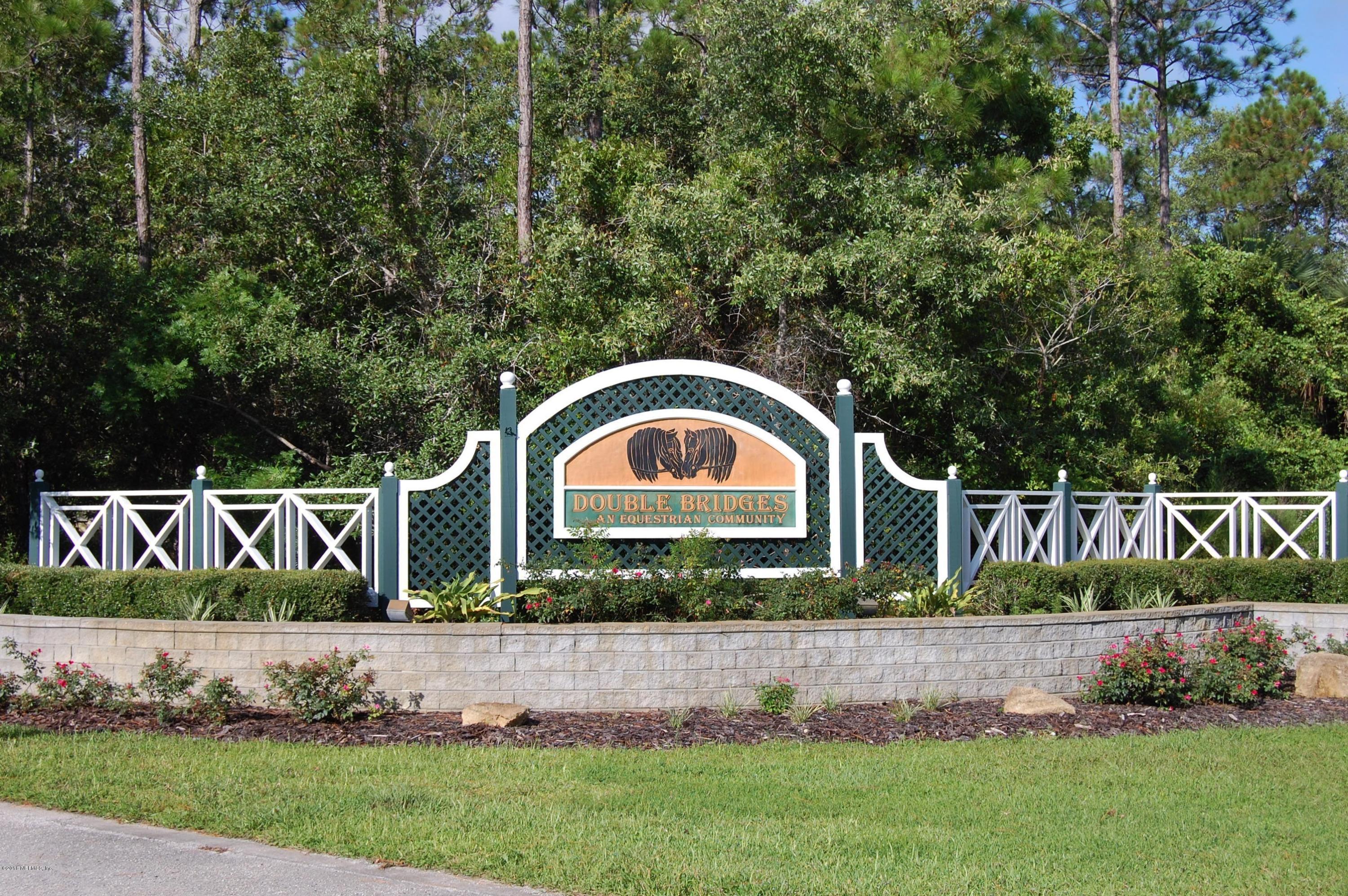 120 Dancing Horse Drive Hastings, FL 32145 - Photo 65 of 65 a front view of a house with a garden
