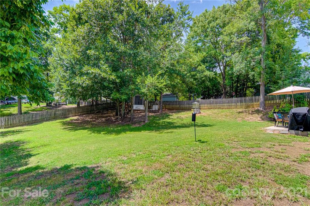 10715 Spruce Mountain Road Charlotte, NC 28214 - Photo 30 of 33 a house view with a garden space