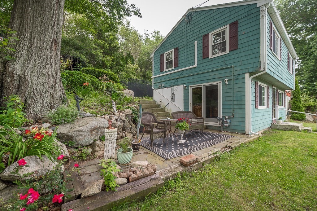 133 Thatcher Road Gloucester, MA 01930 - Photo 19 of 32 a view of outdoor seating area with green space