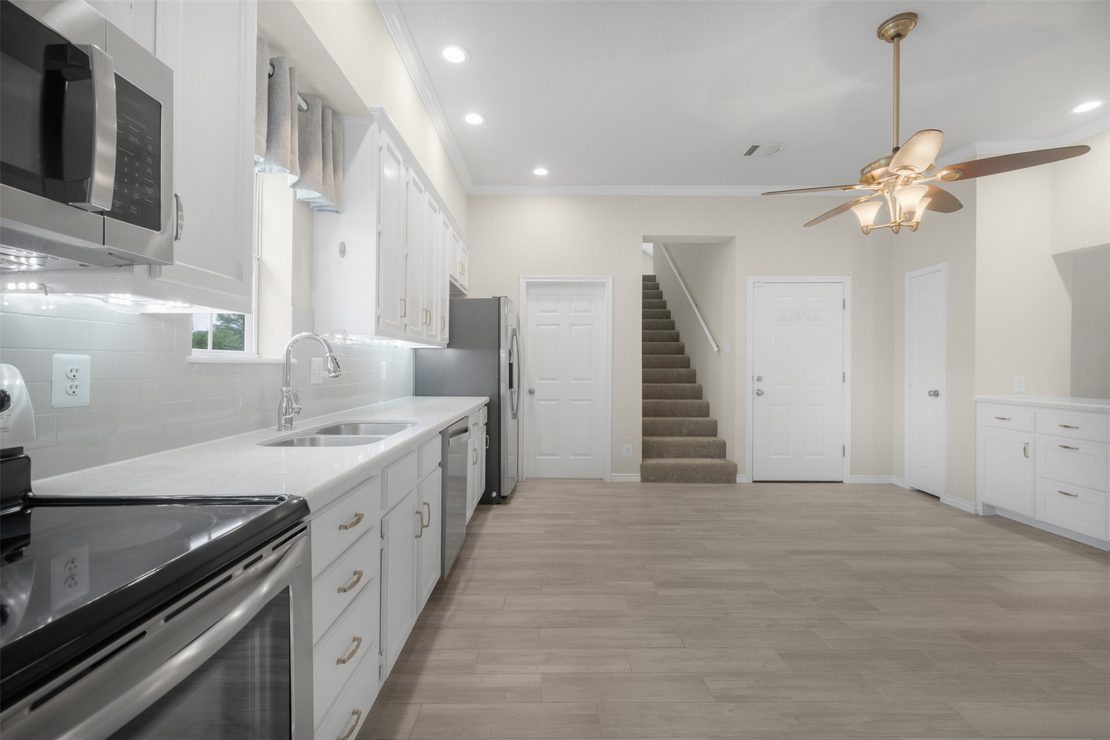 3500 Fazzino Lane Bryan, TX 77807 - Photo 11 of 42 Showing view to laundry area, bonus room and garage.