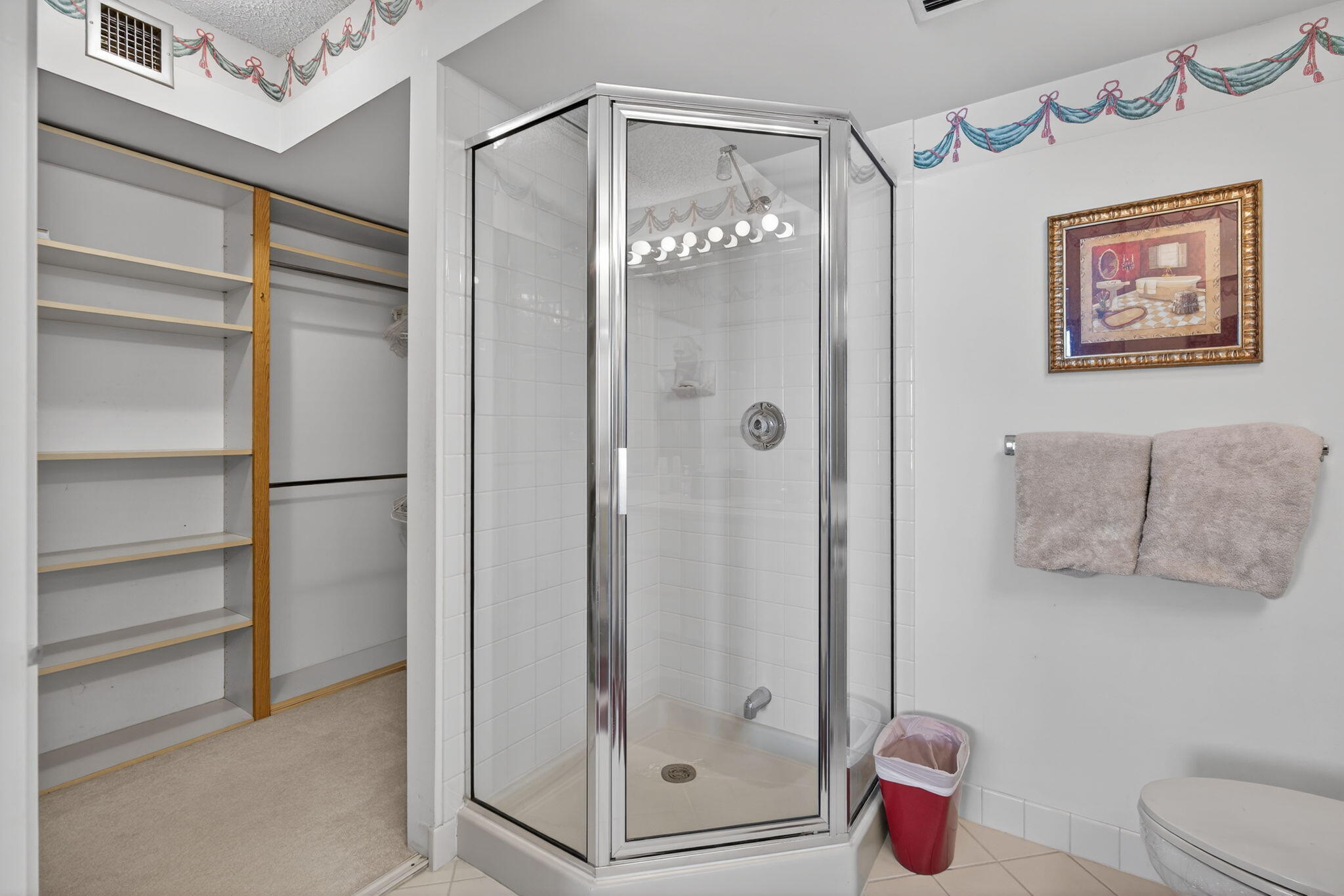 2601 Village Boulevard, Unit 303 West Palm Beach, FL 33409 - Photo 14 of 23 a bathroom with a shower and a toilet