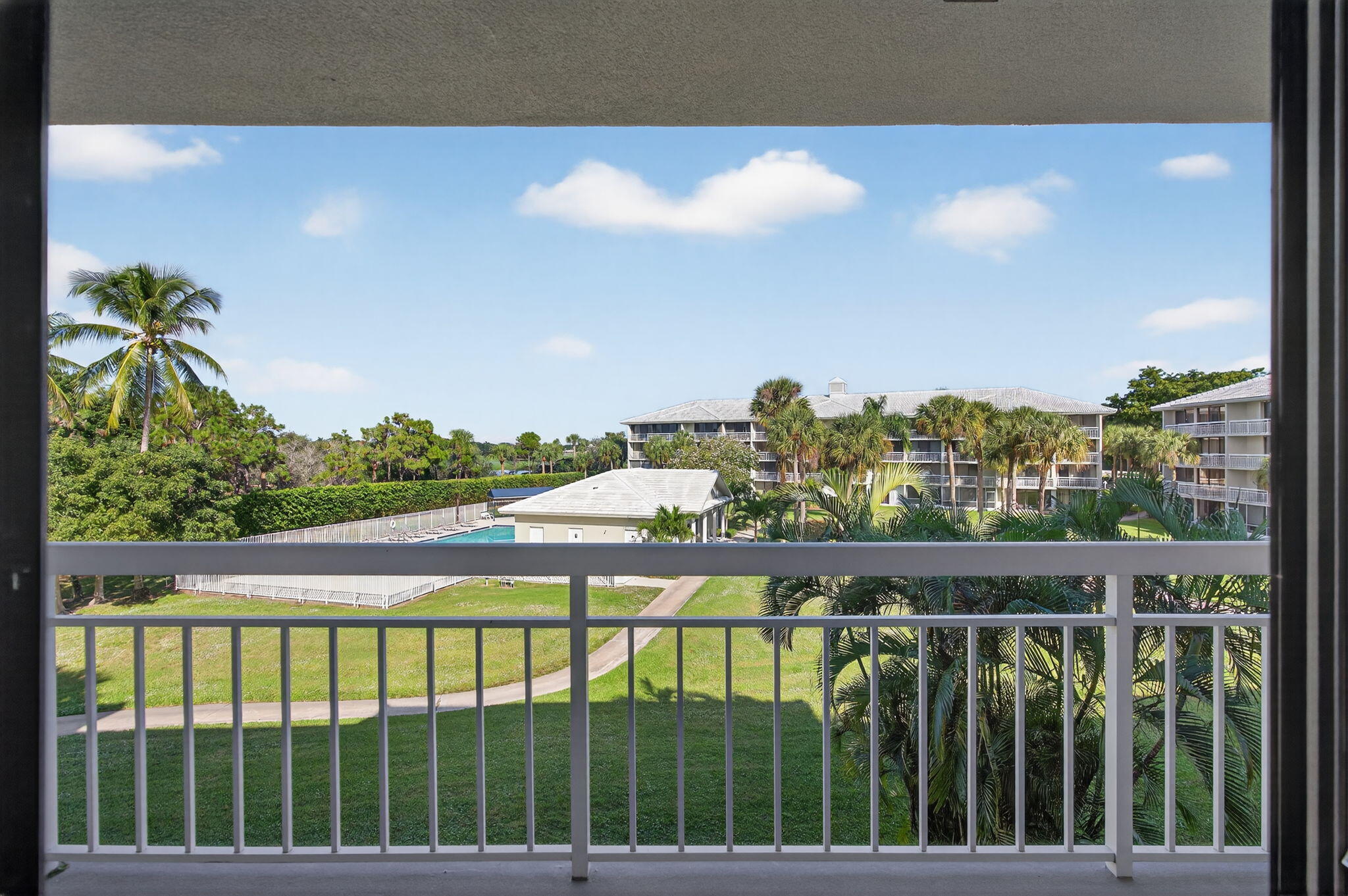 2601 Village Boulevard, Unit 303 West Palm Beach, FL 33409 - Photo 23 of 23 a view of city from a balcony