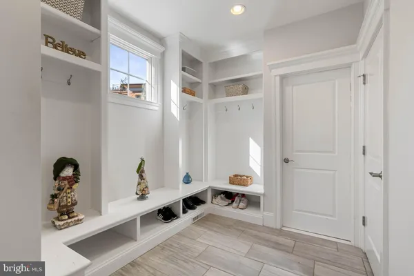 a bedroom with a bed and a view of bathroom