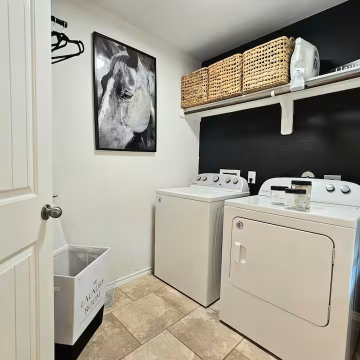 14006 Embrystone Lane Houston, TX 77047 - Photo 11 of 13 a utility room with dryer and washer