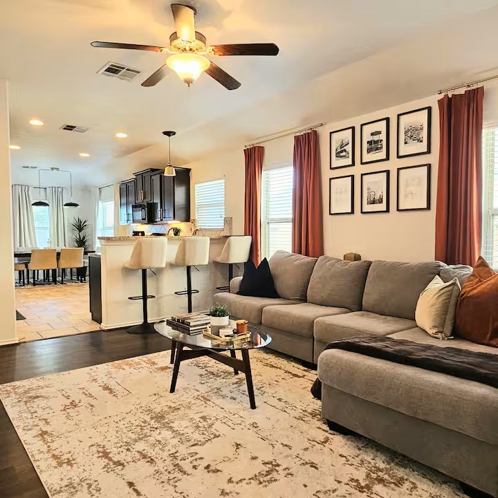 14006 Embrystone Lane Houston, TX 77047 - Photo 3 of 13 a living room with furniture and a dining table