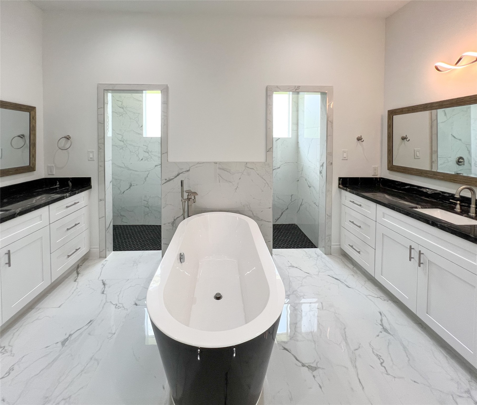 126 Lakeland Circle Rosharon, TX 77583 - Photo 23 of 41 Primary bathroom making a statement with its free-standing tub.