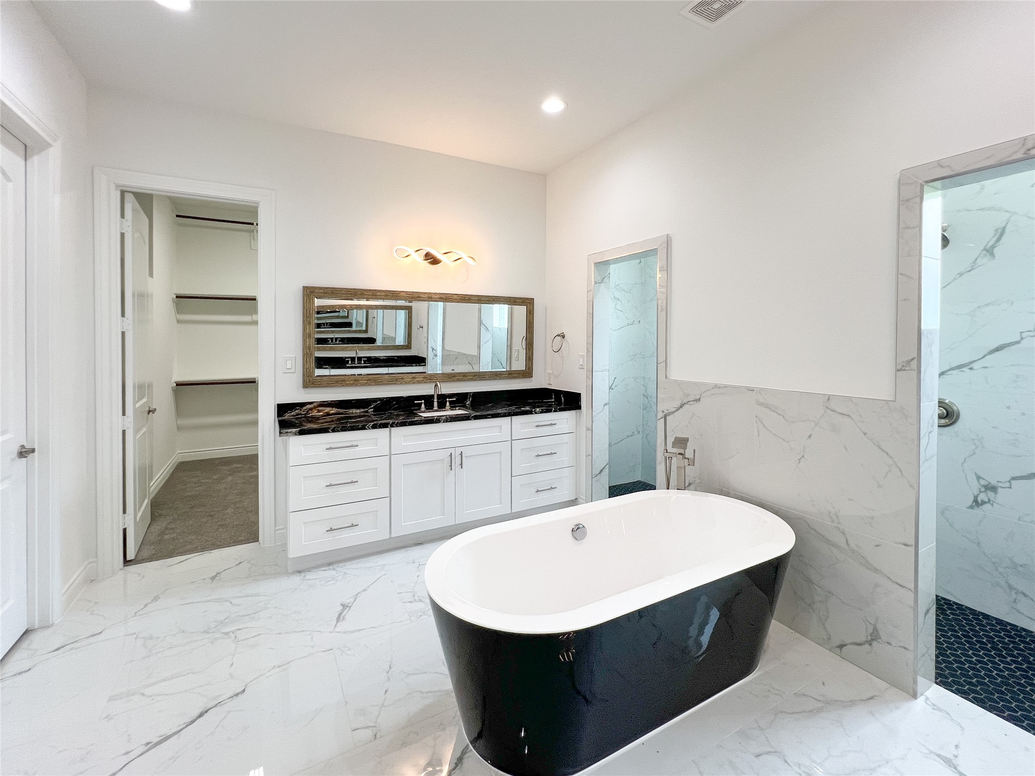 126 Lakeland Circle Rosharon, TX 77583 - Photo 24 of 41 With that sleek stand alone design gives it a spa-like feel.